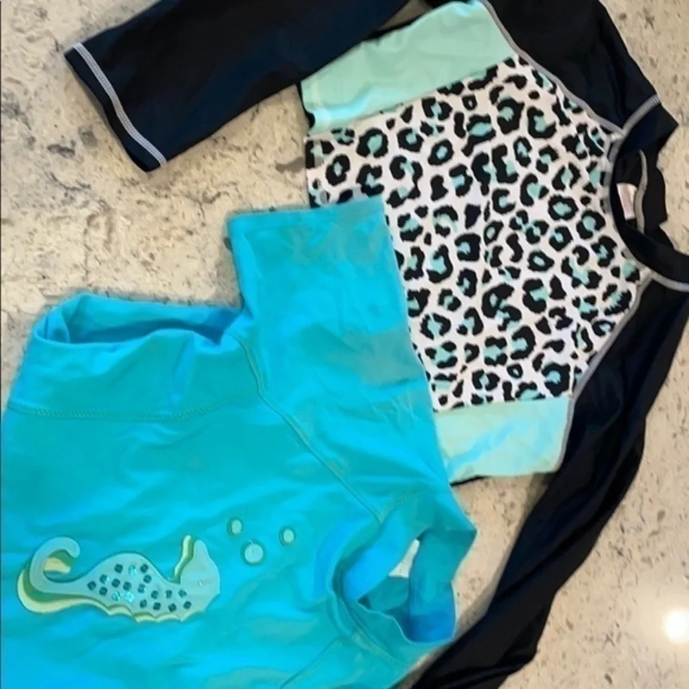 Lands end tops 12-14 bundle shorts and 2. Swim shirts